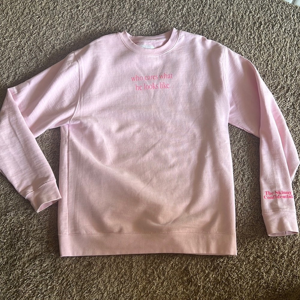 Pink crewneck sweater by the skinny confidential podcast